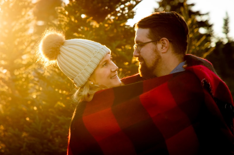 Intimate couple sharing tender moment during golden hour event photography session in Madison, Wisconsin